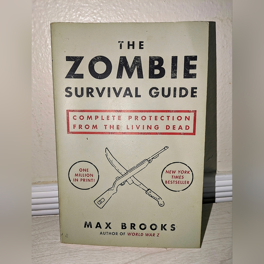 The Zombie Survival Guide by Max Brooks | Zombie Survival Satire | Paperback